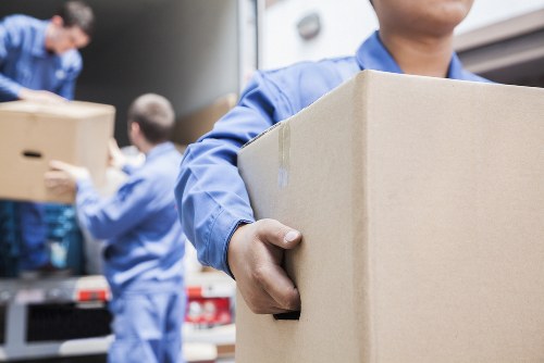 Commercial moving team planning a business relocation in Mileend