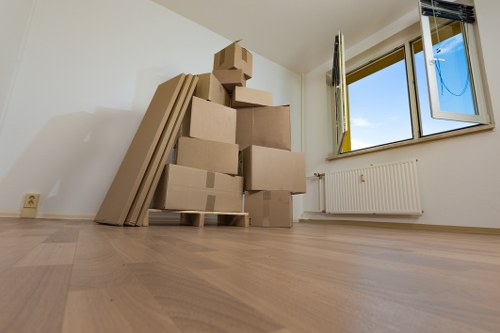 Trained moving staff handling furniture carefully during a relocation