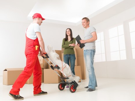 Kitchen and bedroom items being unpacked and placed neatly in a new home