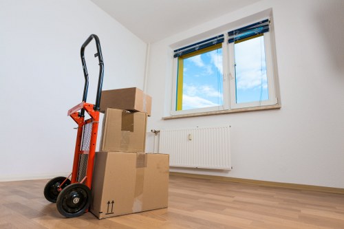 Professional van loading with secure straps and safety checks