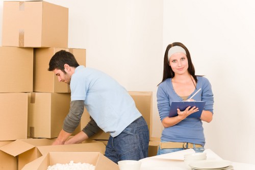 Team handling furniture during an apartment move