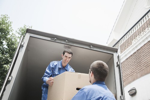 Team loading office furniture during Mile End pickup